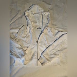 White Hollister size medium cropped, zip up hoodie.